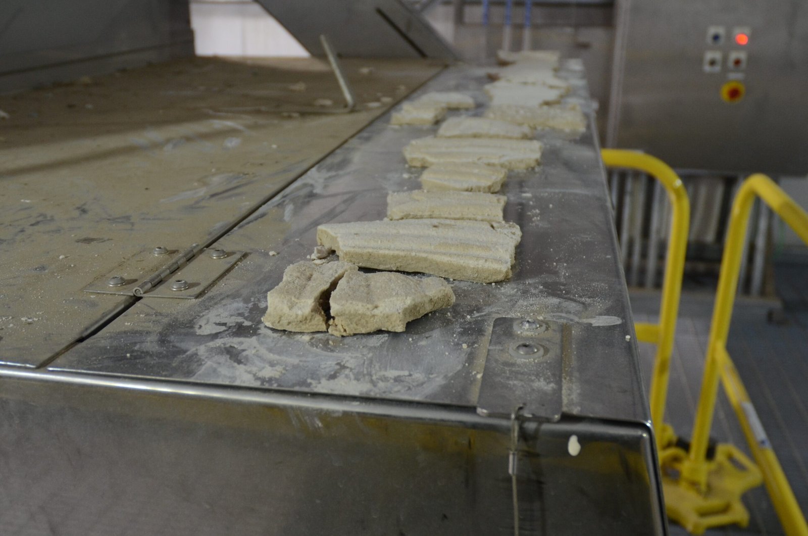 Solid salt cakes produced by a zero liquid discharge system after evaporation and crystallization